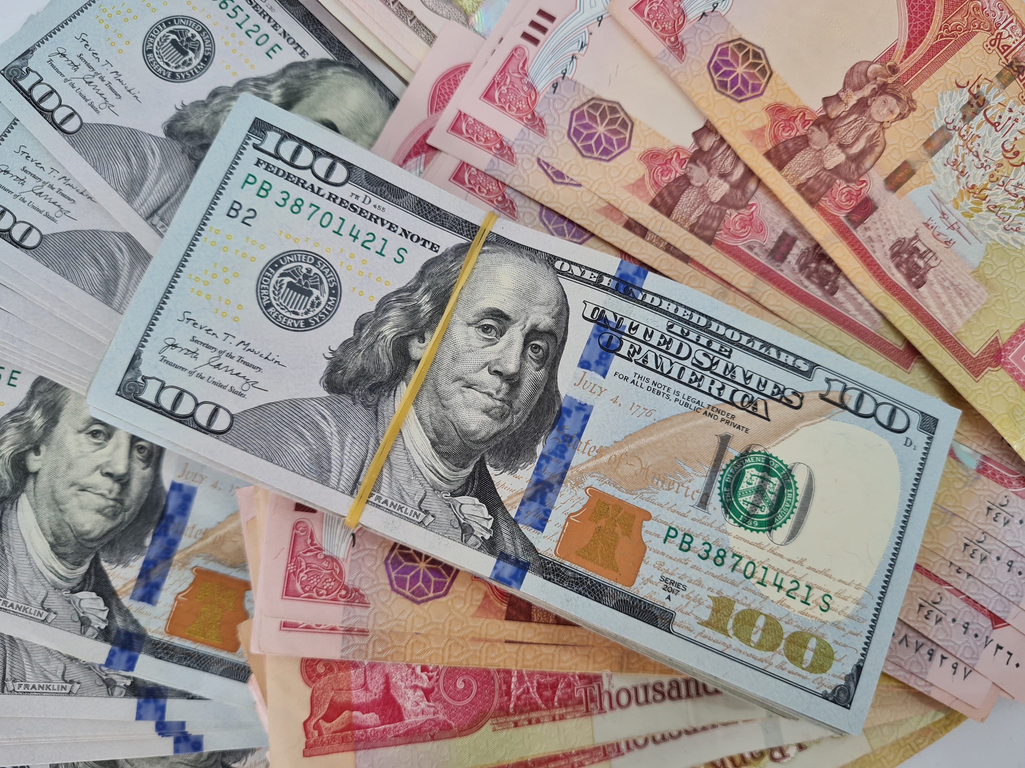 ارتفاع سعر الصرف الى 154 ألف لكل 100 دولار